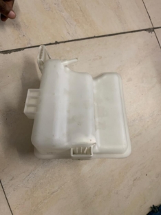 Mazda premacy radiator bottle